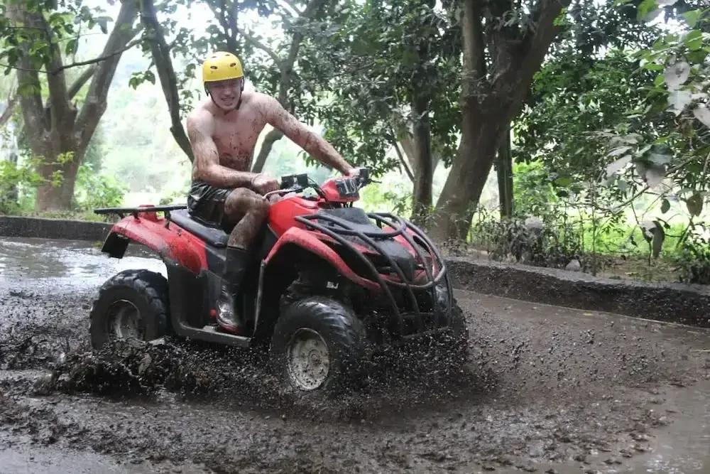 Afternoon ATV ride in Bali with muddy tracks and adventurous off-road terrain