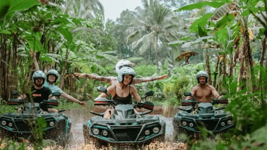 Quad Biking in Ubud Through Tunnel Rice Fields Puddles